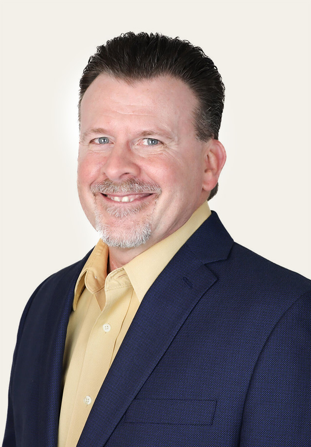 Warren Balcom headshot Warren Balcom headshot